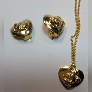 Wendy Gell Disney gold pendant with matching earrings Mickey relief in heart.